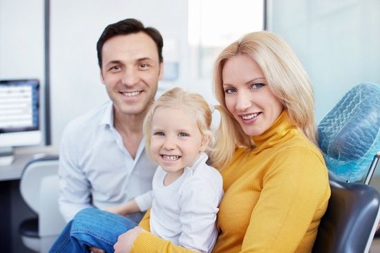 Family in the dental clinic