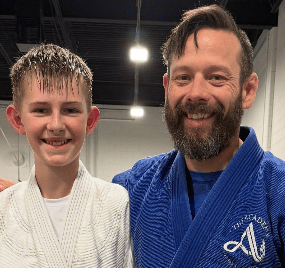 Kids and adults practicing Brazilian Jiu-Jitsu at The Academy Eden Prairie in Minneapolis, MN.