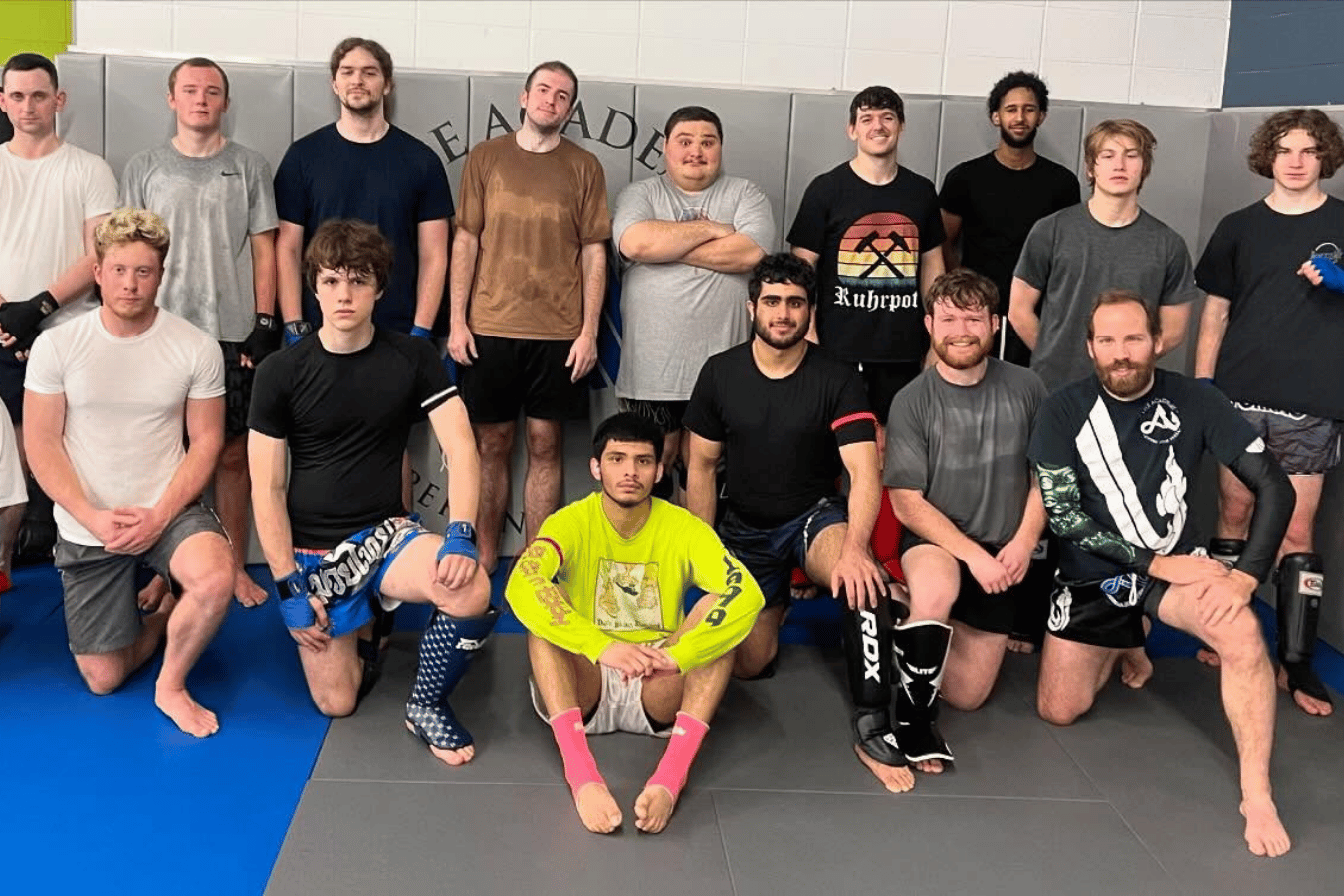 Adults drilling Brazilian Jiu-Jitsu techniques at The Academy Eden Prairie in Minneapolis, MN.