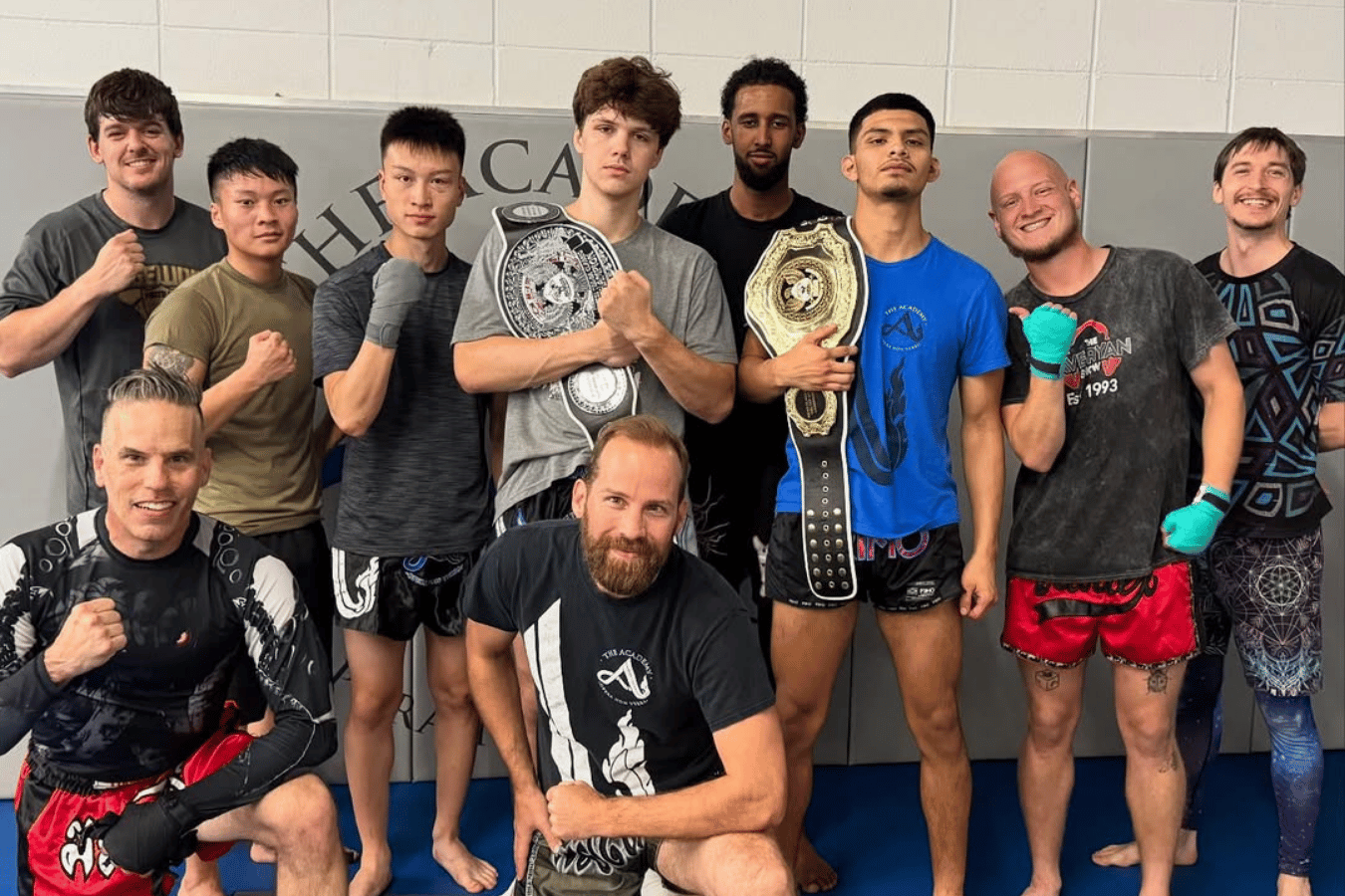 Beginner students drilling Brazilian Jiu-Jitsu escapes at The Academy Eden Prairie in Minneapolis.