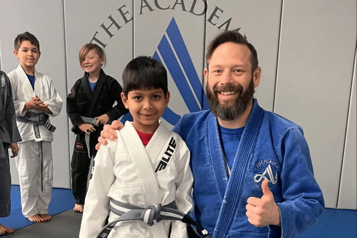 Beginners practice Brazilian Jiu-Jitsu drills at The Academy Eden Prairie in Minneapolis, MN to build safe confidence.