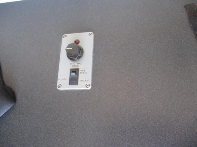 A switch on a wall with a knob on it