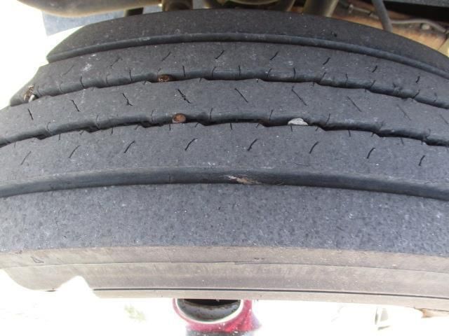 A close up of a tire on a vehicle