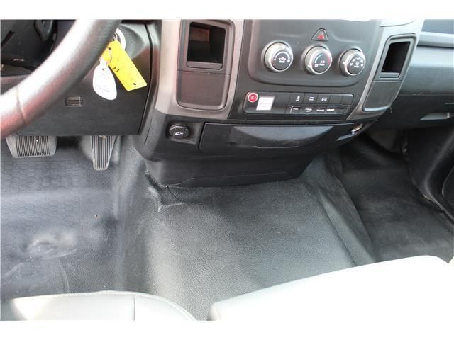 A car with a yellow tag on the steering wheel