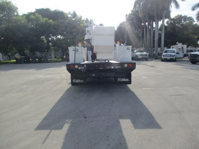 A ram truck is parked in a parking lot