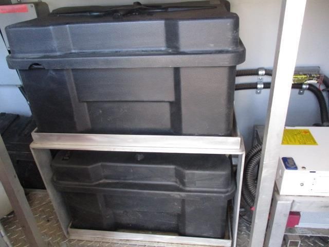 A bunch of black boxes are stacked on top of each other