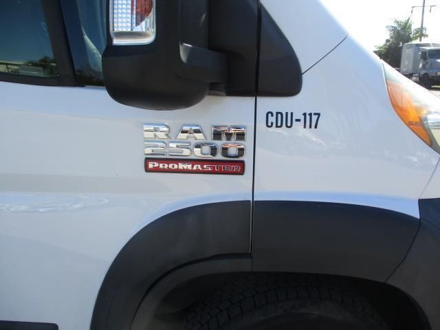 A white ram 2500 van with cdu-117 written on the side