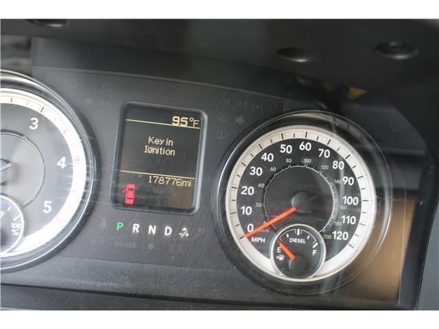 A close up of a car 's dashboard shows that the temperature is 95 degrees