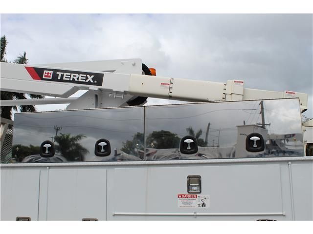 A terex truck with a crane on top of it