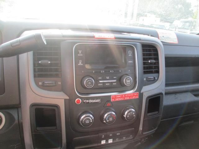 A close up of the dashboard of a dodge ram truck.