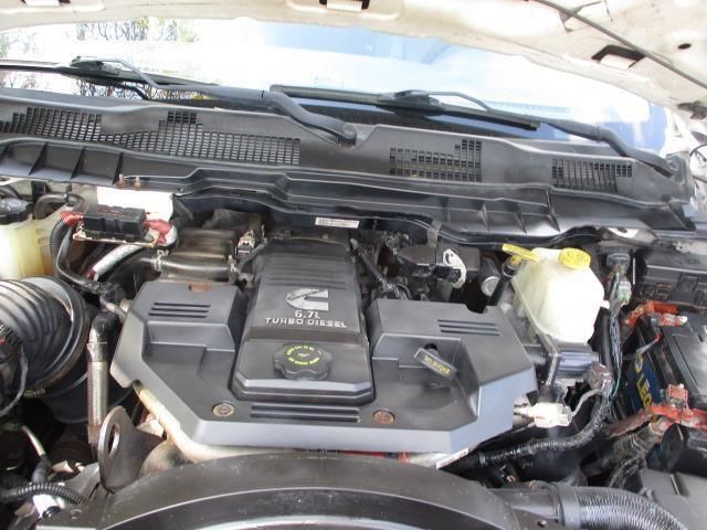 The engine of a dodge ram truck with the hood open