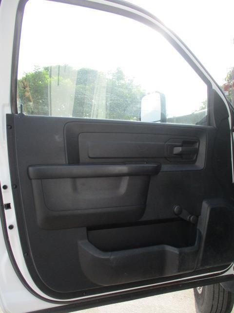 A close up of a car door with the door open