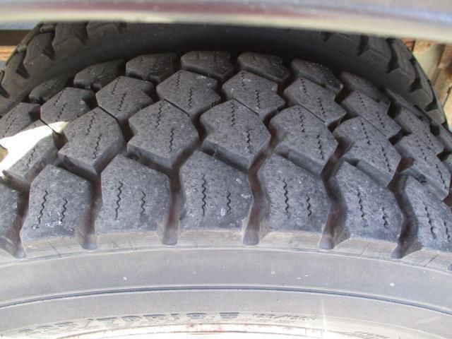 A close up of a tire on a vehicle