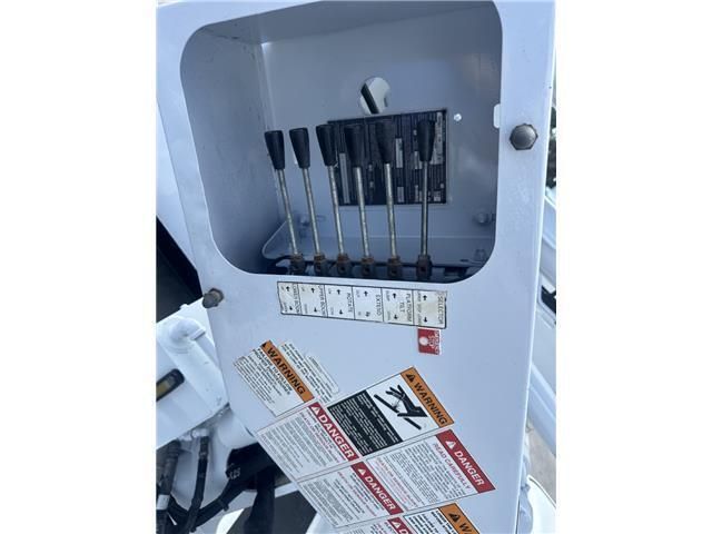 A white box with a bunch of buttons on it.