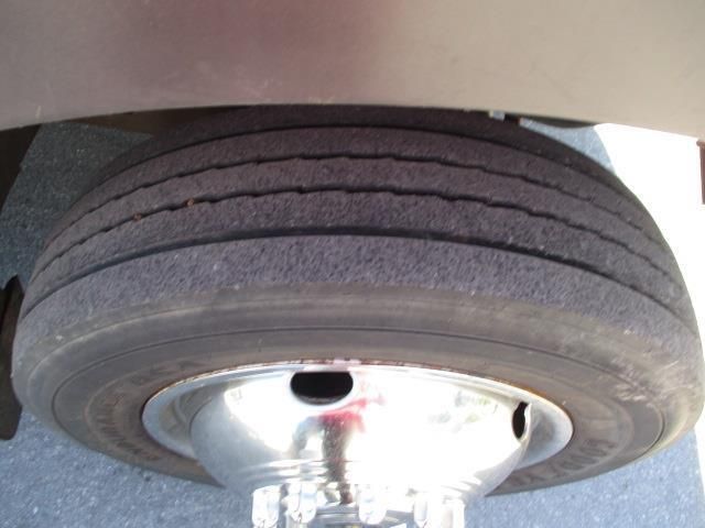 A close up of a tire on a car