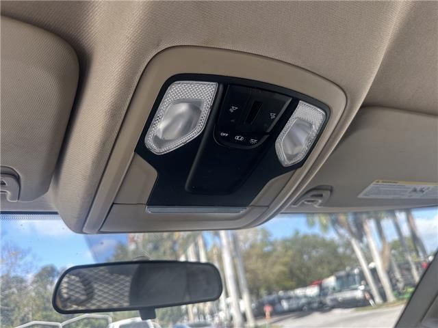 A car with a sun visor and a rear view mirror