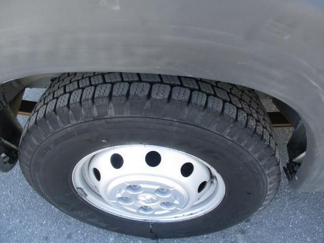 A close up of a tire on a car