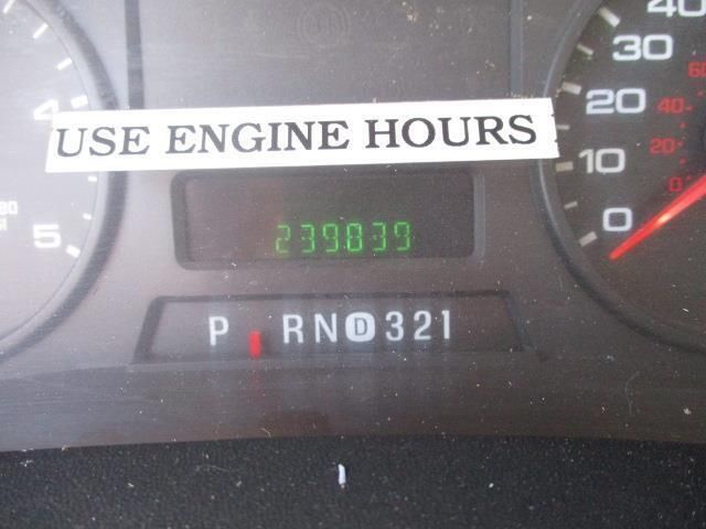 A close up of a gauge that says use engine hours