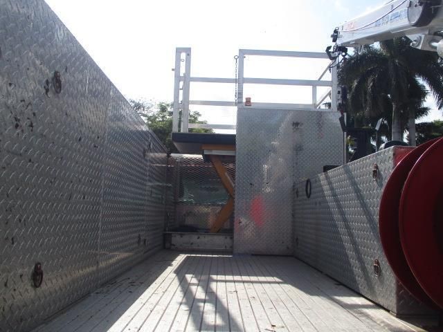 The inside of a truck with a crane on top of it