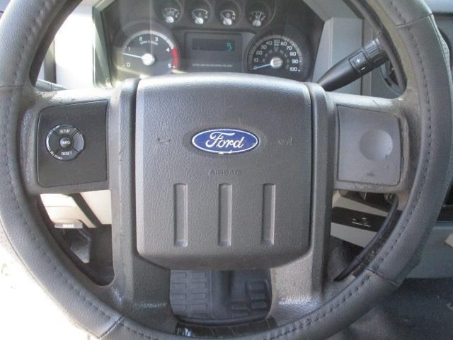 A close up of a ford steering wheel