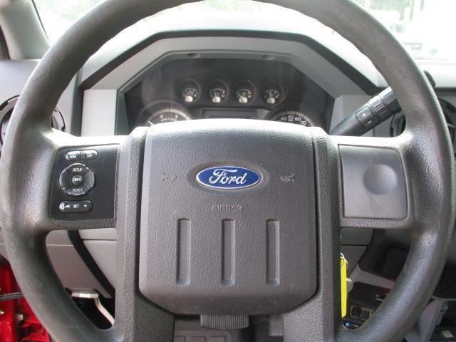 A close up of a ford steering wheel