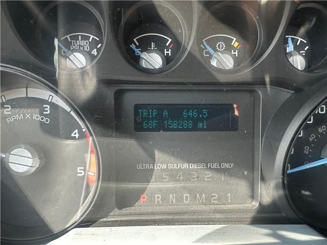 A close up of a car dashboard showing trip a