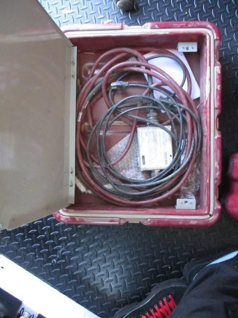 A box with a bunch of wires inside of it