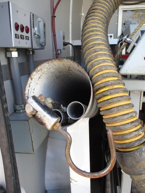 A large hose with a hook attached to it