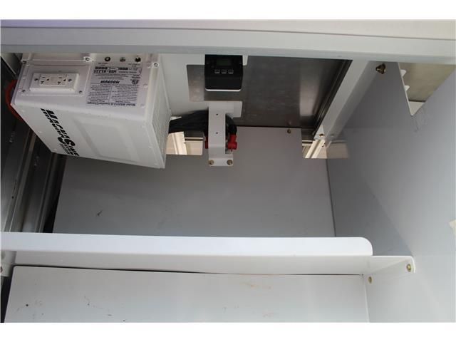 A white box with a sticker on it that says ' stainless steel '