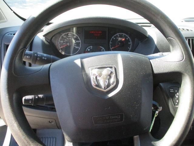 A close up of a dodge steering wheel