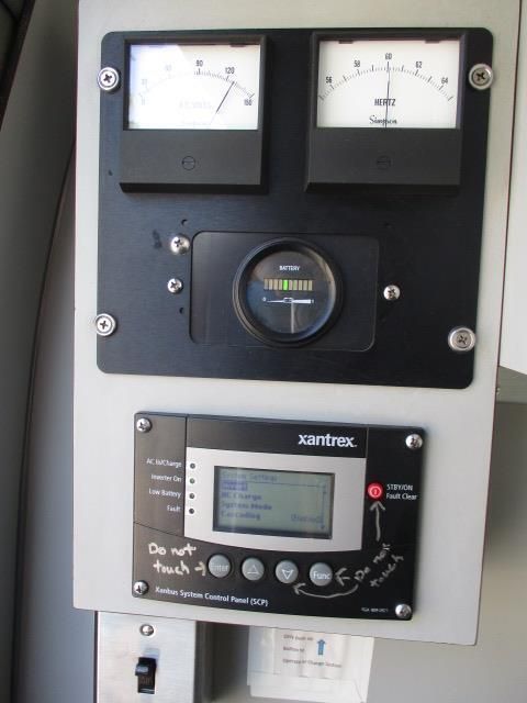 A panel with a display that says ' do not touch ' on it