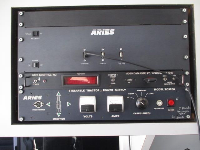 A black box with the word aries on it