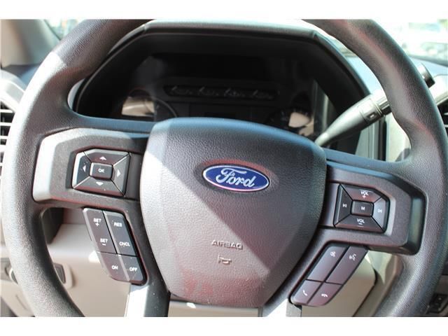 A close up of a ford steering wheel