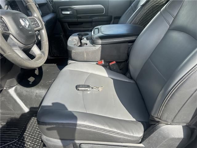 A close up of a car seat with a key in it