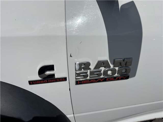 The side of a white ram 3500 heavy duty truck
