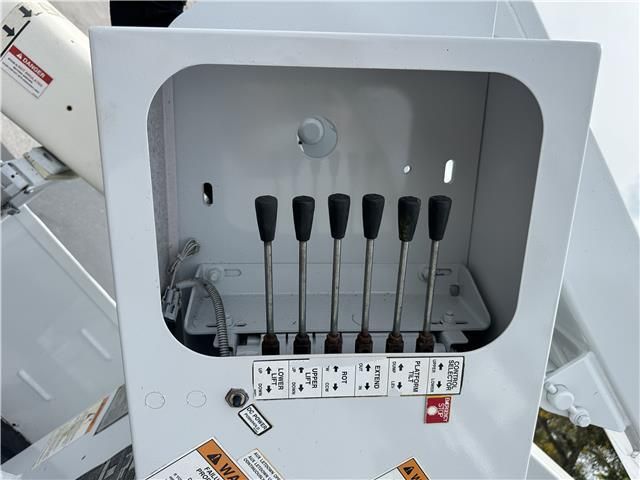 A white box with a bunch of controls inside of it