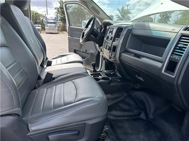 The interior of a dodge ram truck with leather seats