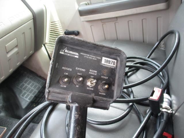 A remote control in a car with the number 18679 on it