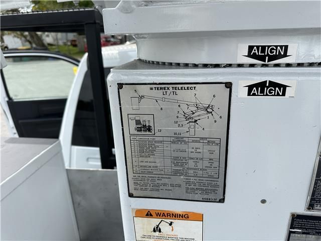 A white machine with a sticker that says align on it
