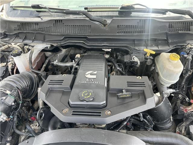 A close up of the engine of a dodge ram truck.