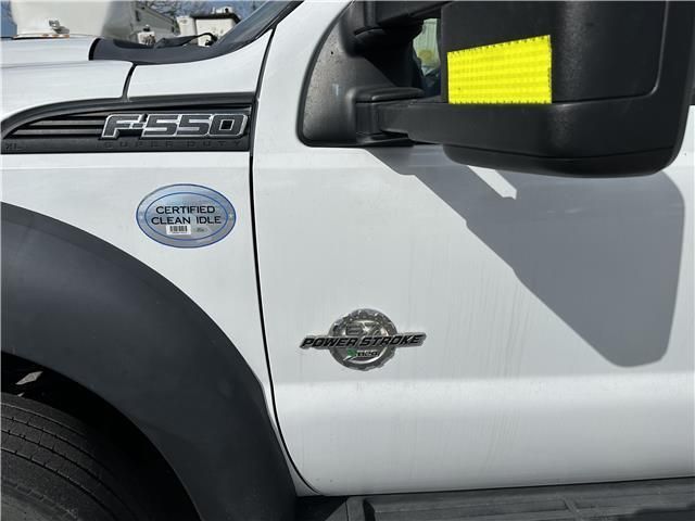 A white truck with the word ford on the side