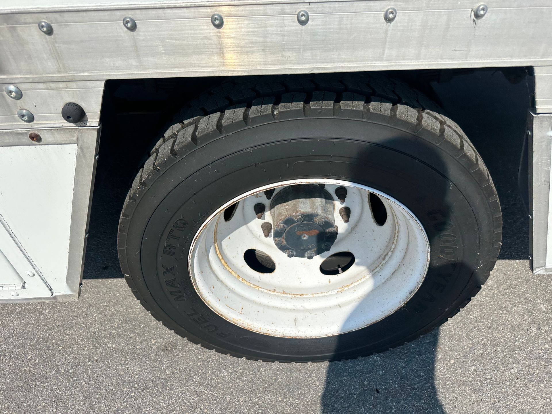 A close up of a tire on a truck.