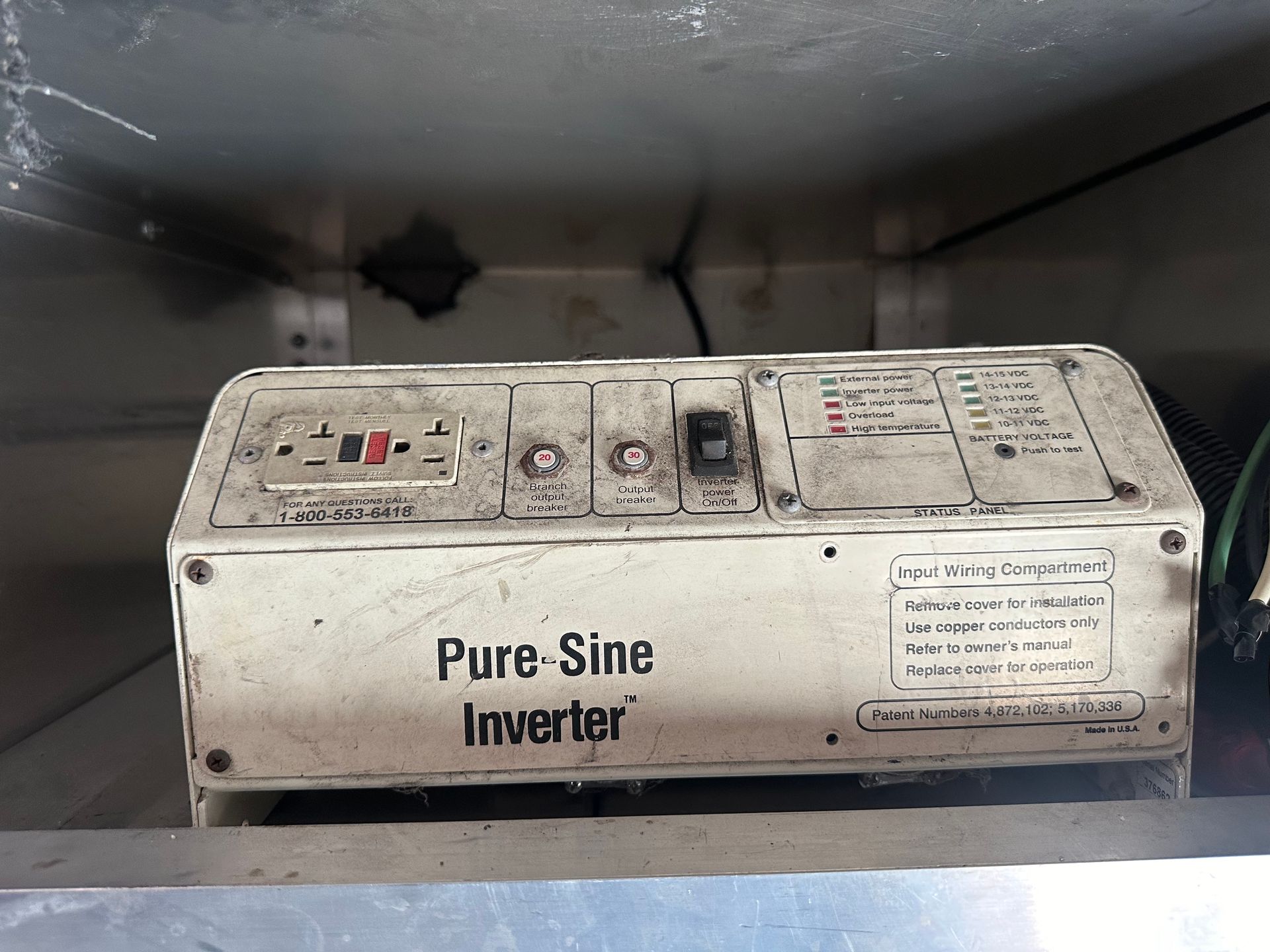A white box that says pure sine inverter on it