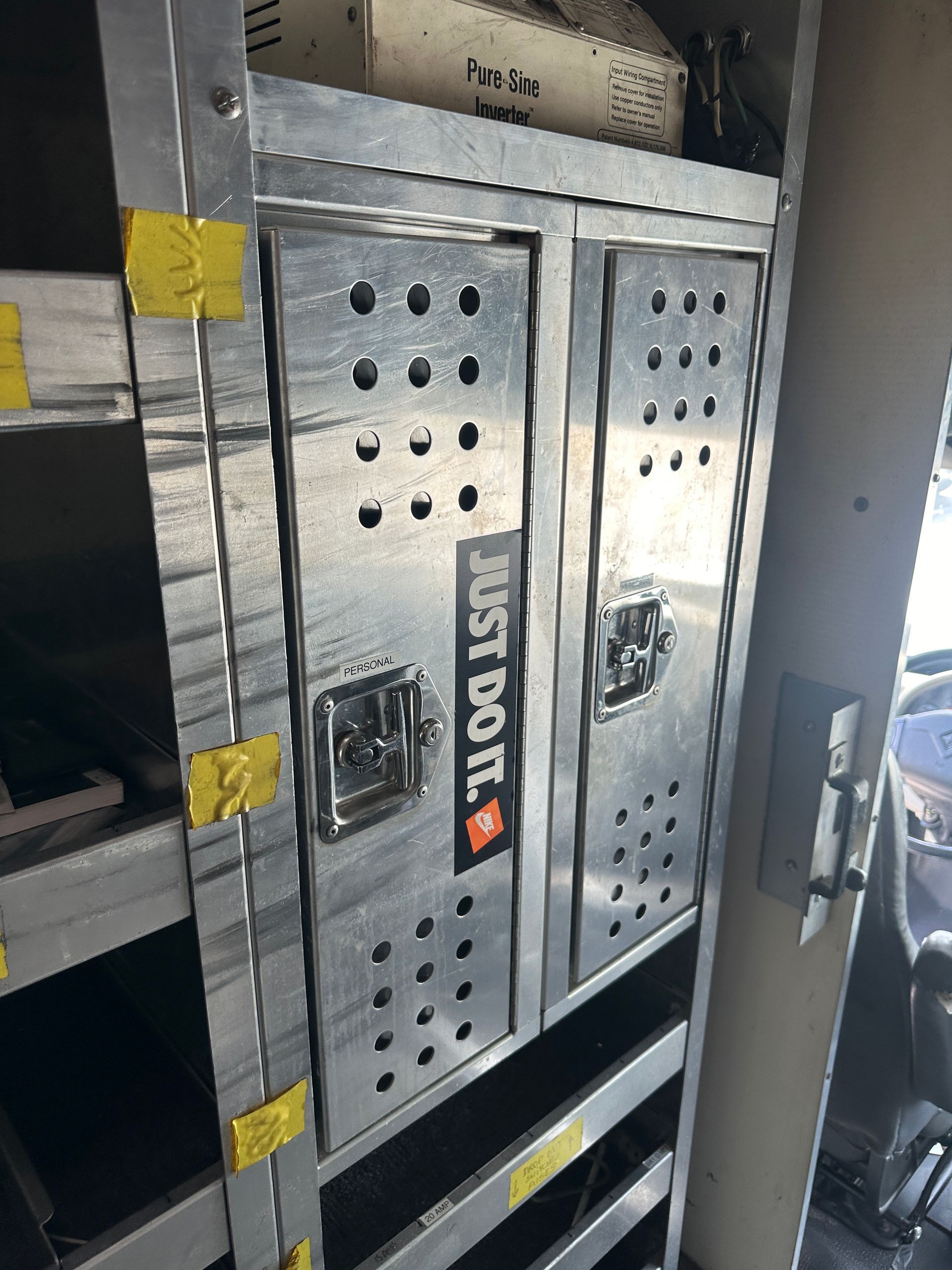 A metal locker with a sticker that says `` just do it '' on it.