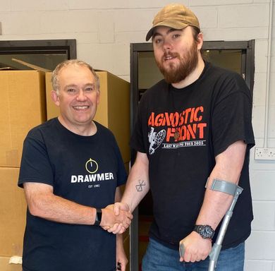 Tristan (right) with John Lamb of DRAWMER at their facility in Rotherham.