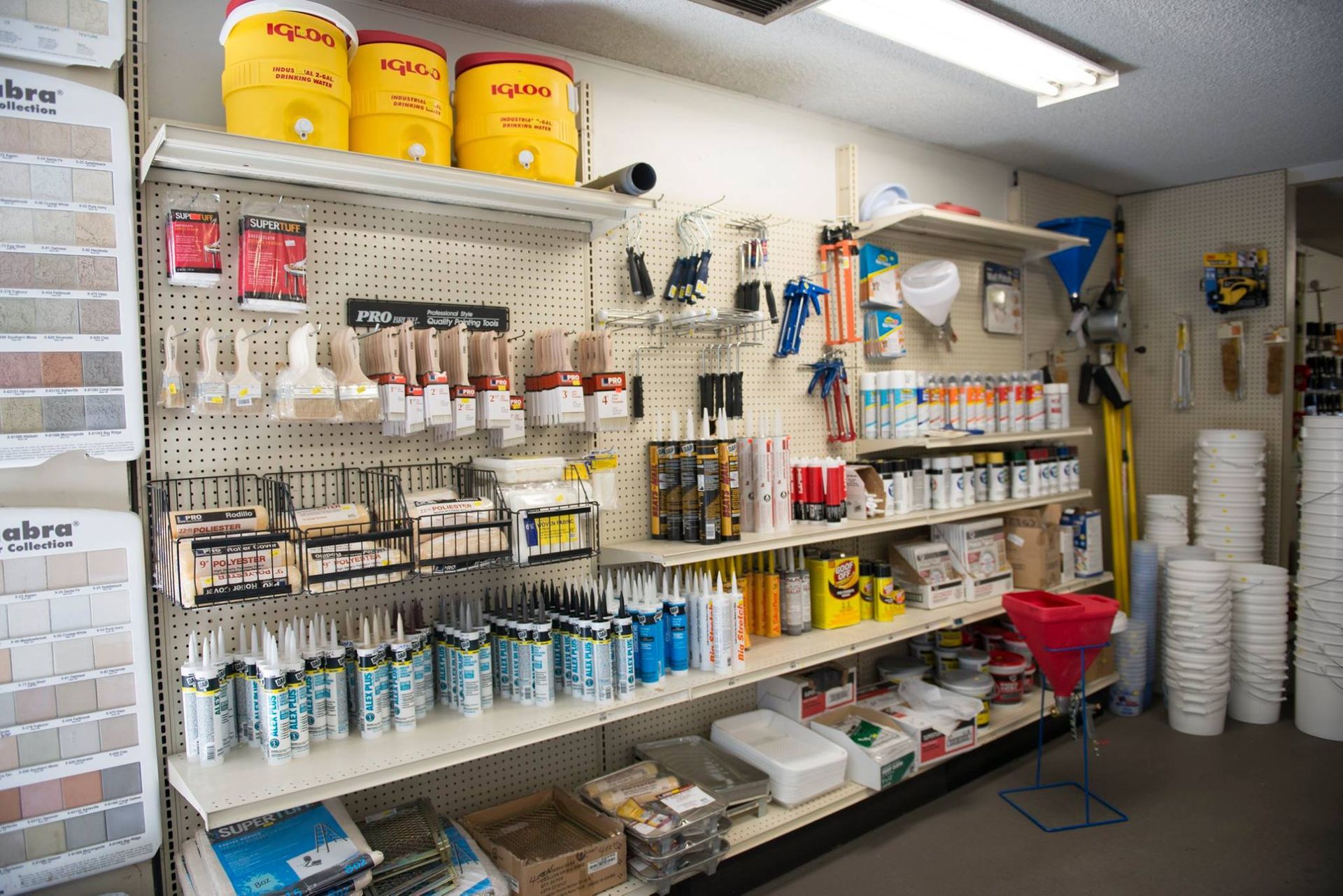 A store filled with shelves filled with lots of supplies.