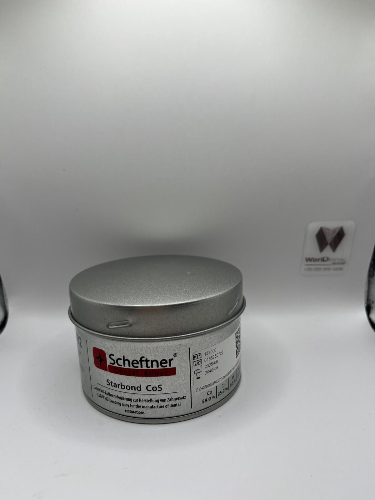 Un contenitore cilindrico argentato di gel Scheftner Polident, materiale per laboratorio odontotecnico, su uno sfondo bianco uniforme.