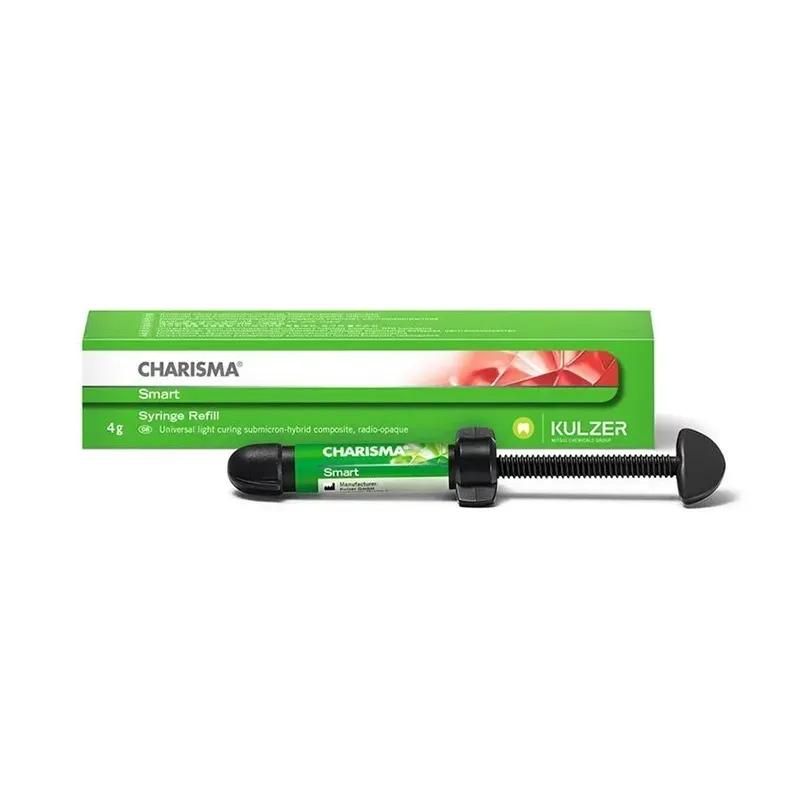 Una siringa per composito dentale e la sua confezione verde con l'etichetta 