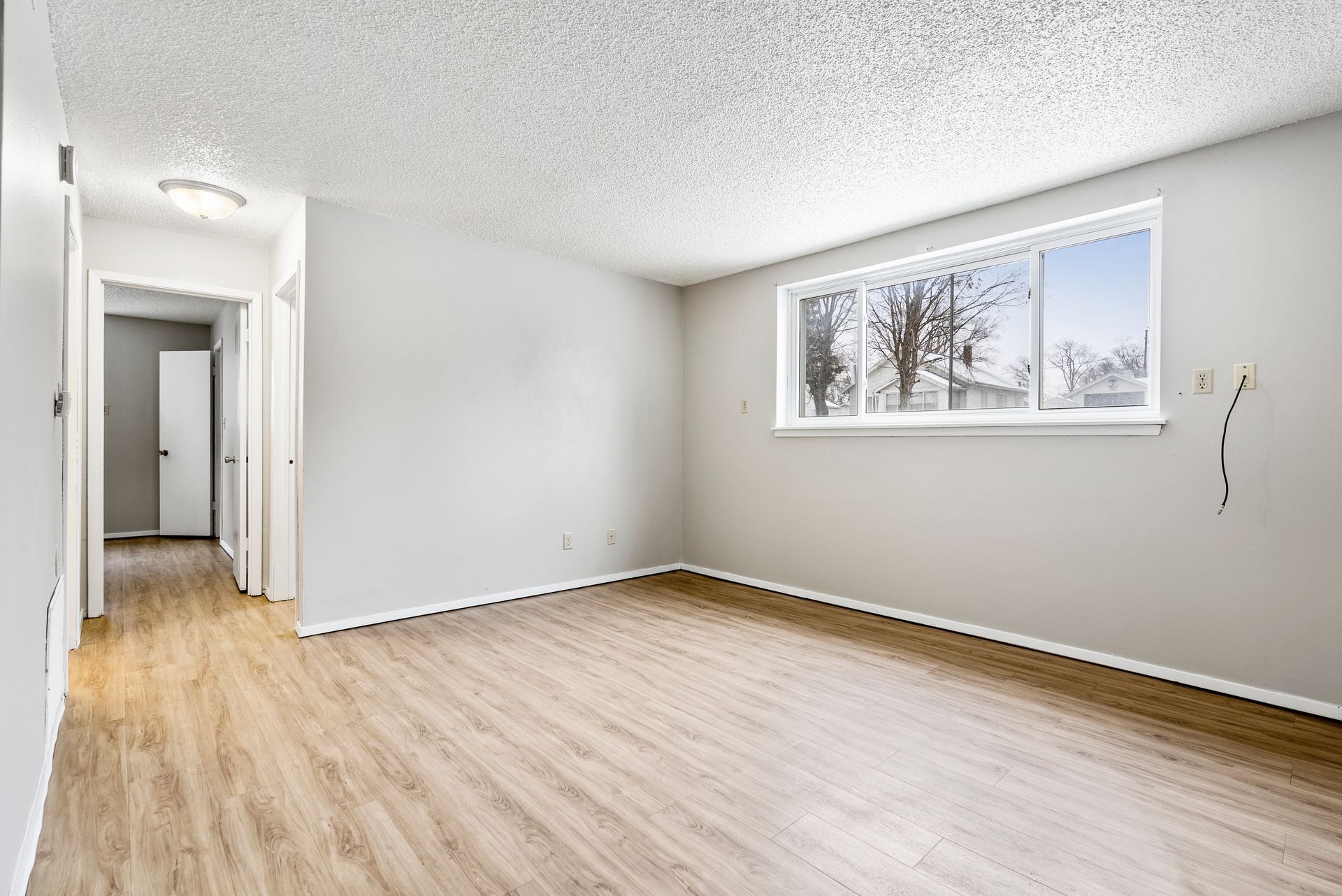 photo of a bedroom with high-set, wide window