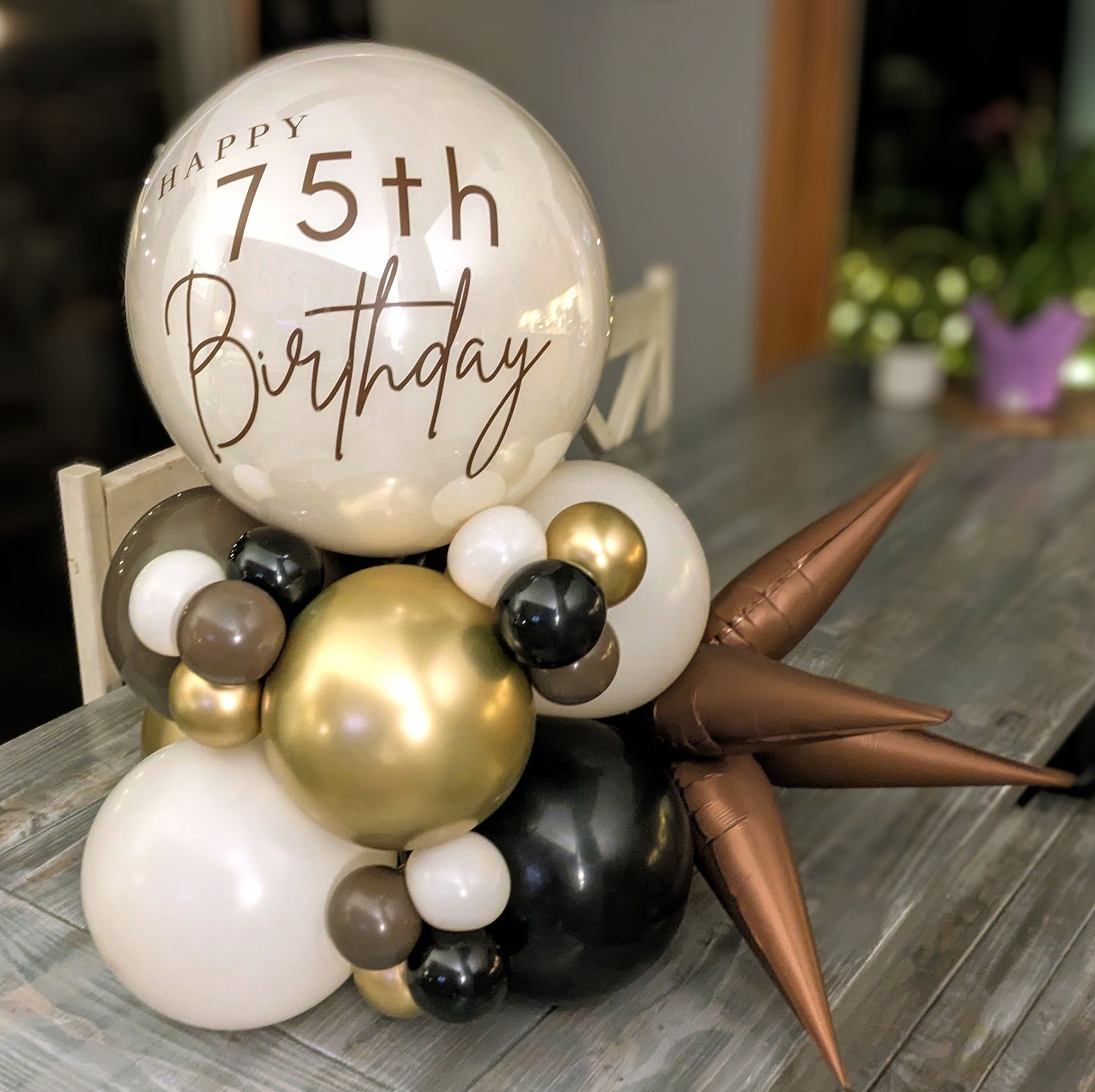 Balloon arrangement for a 75th birthday. 